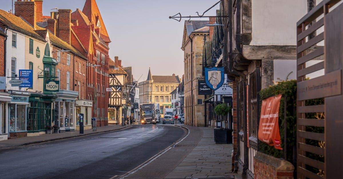 Picturesque street scene in Stratford-upon-Avon, England showcasing charming architecture at dusk.