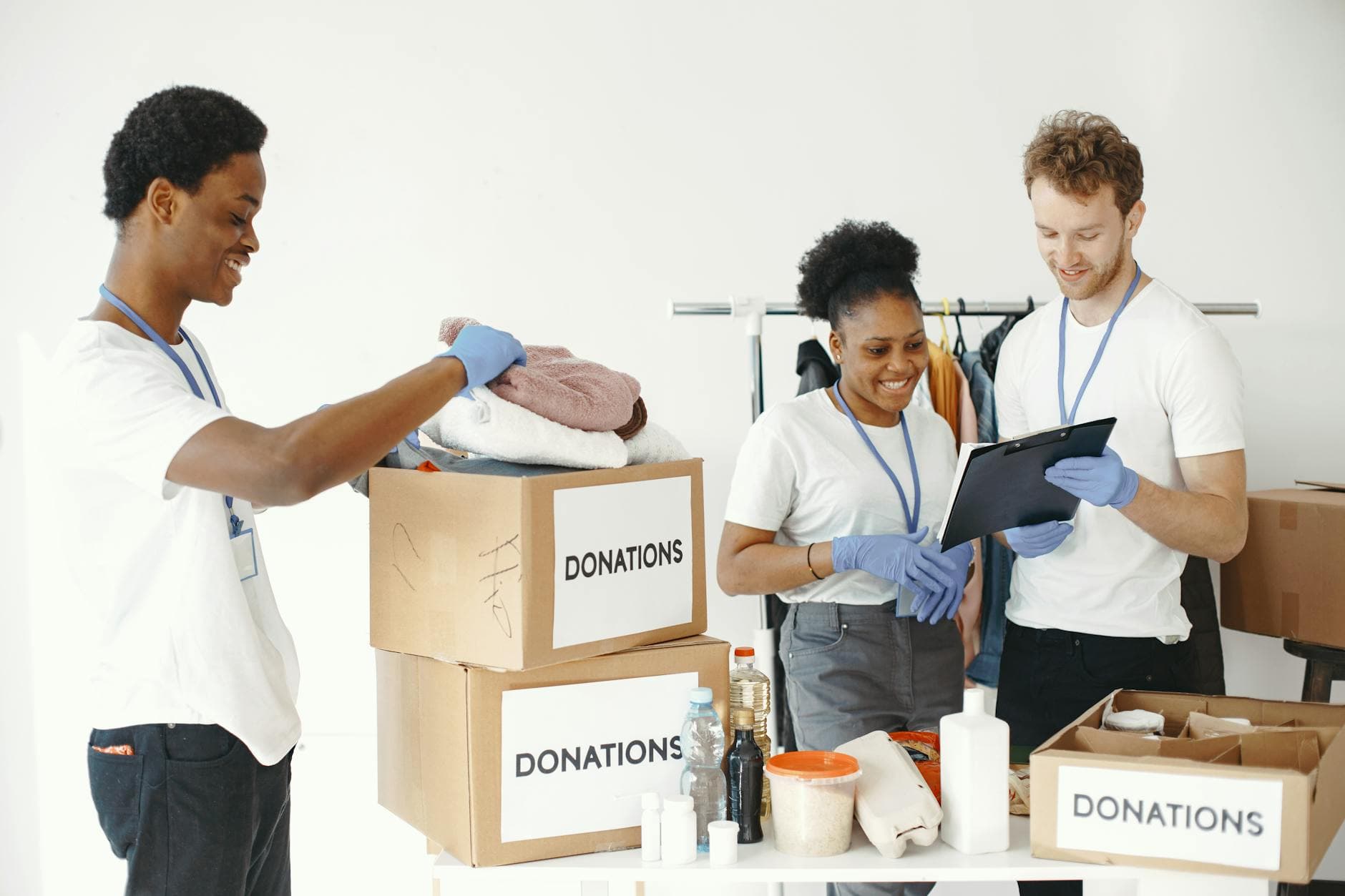 A UK charity accountant reviewing financial statements and SORP compliance documents in a modern office in Manchester.