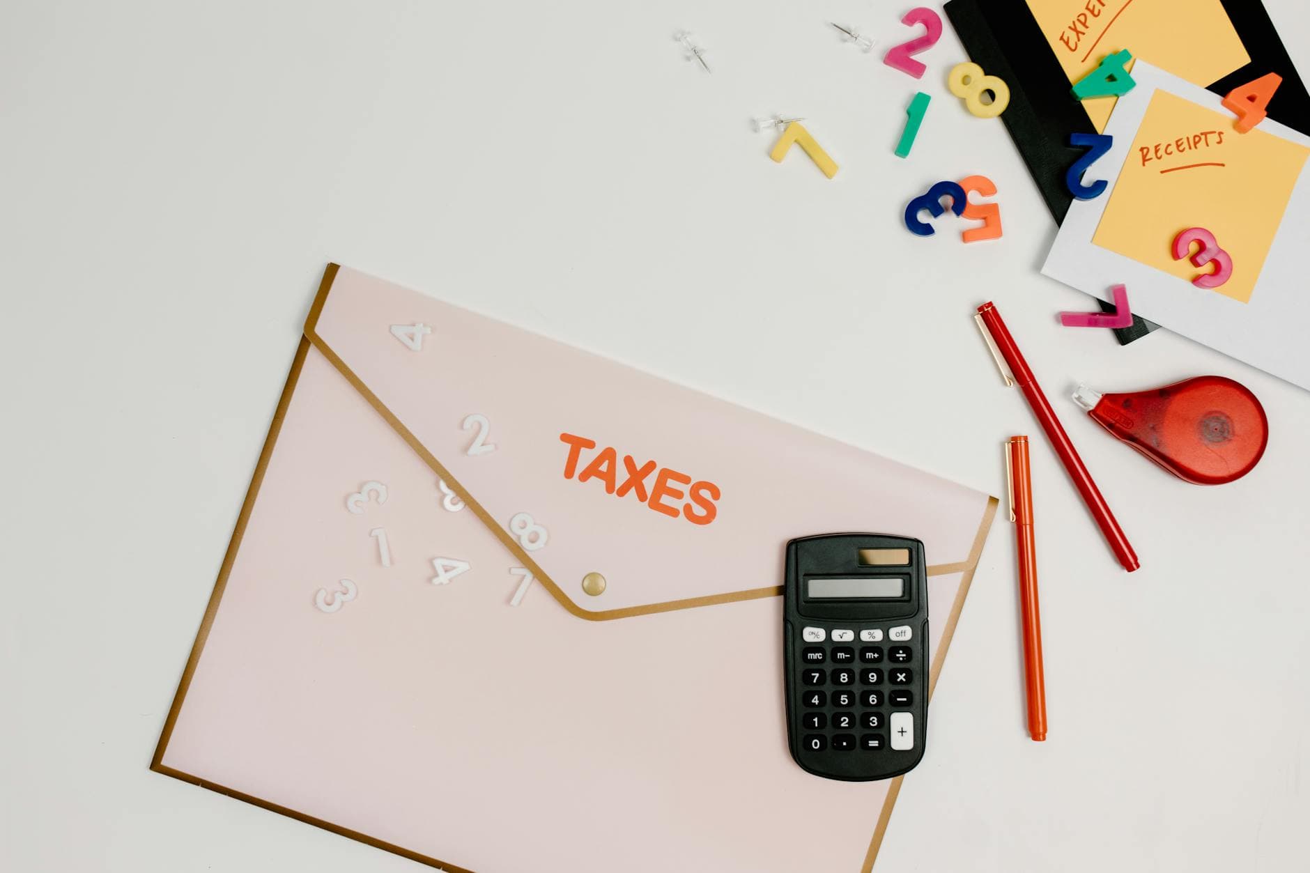 UK OnlyFans creator reviewing tax records with an ICAEW qualified accountant in a modern office setting