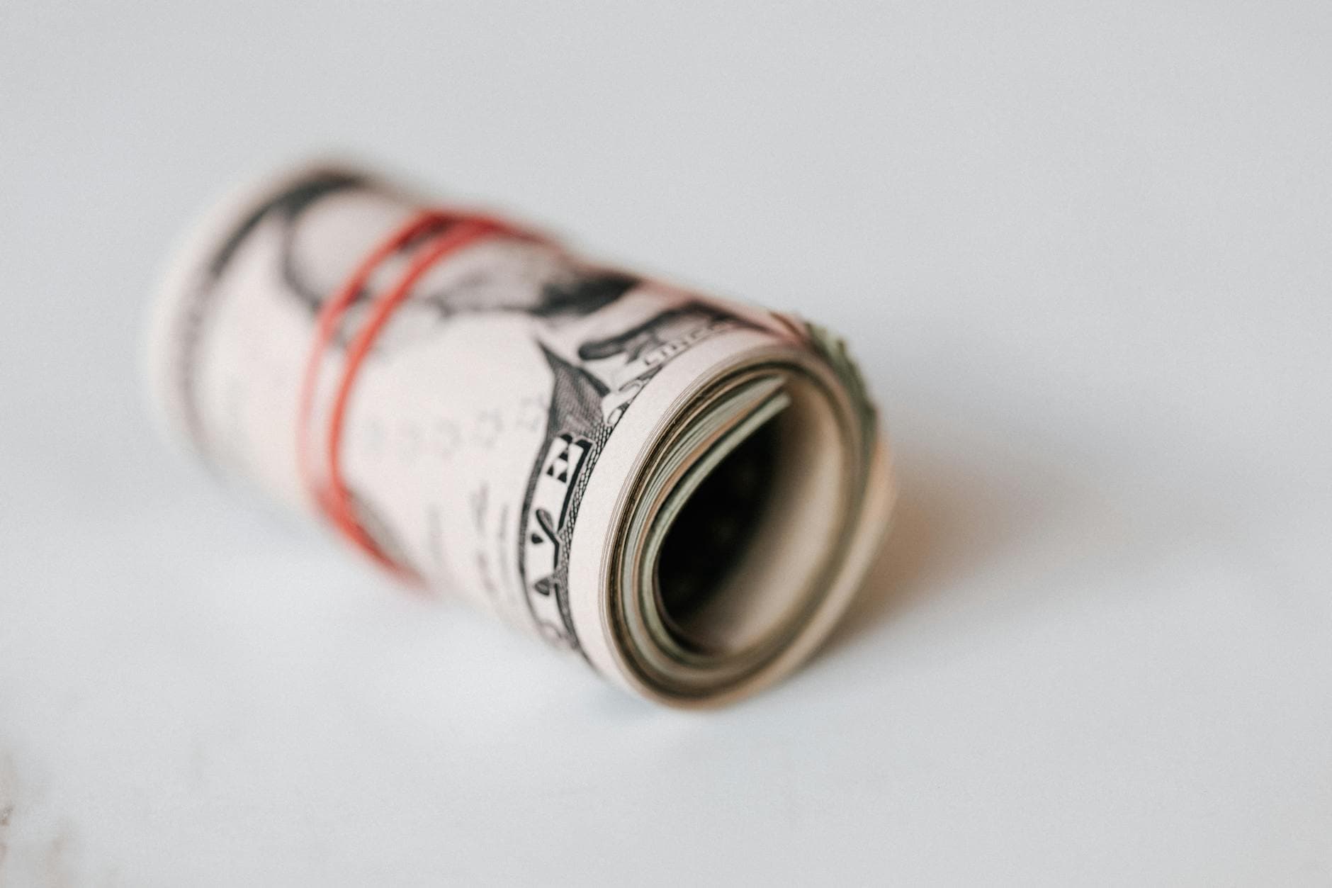 UK accountant reviewing company accounts with significant cash reserves for BADR planning