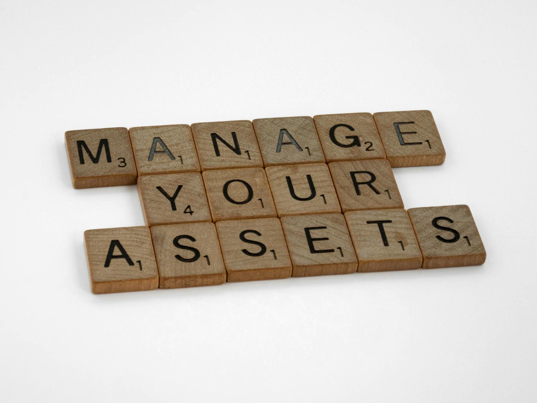 Business owner reviewing property investment subsidiary structure with accountant in a Manchester office.