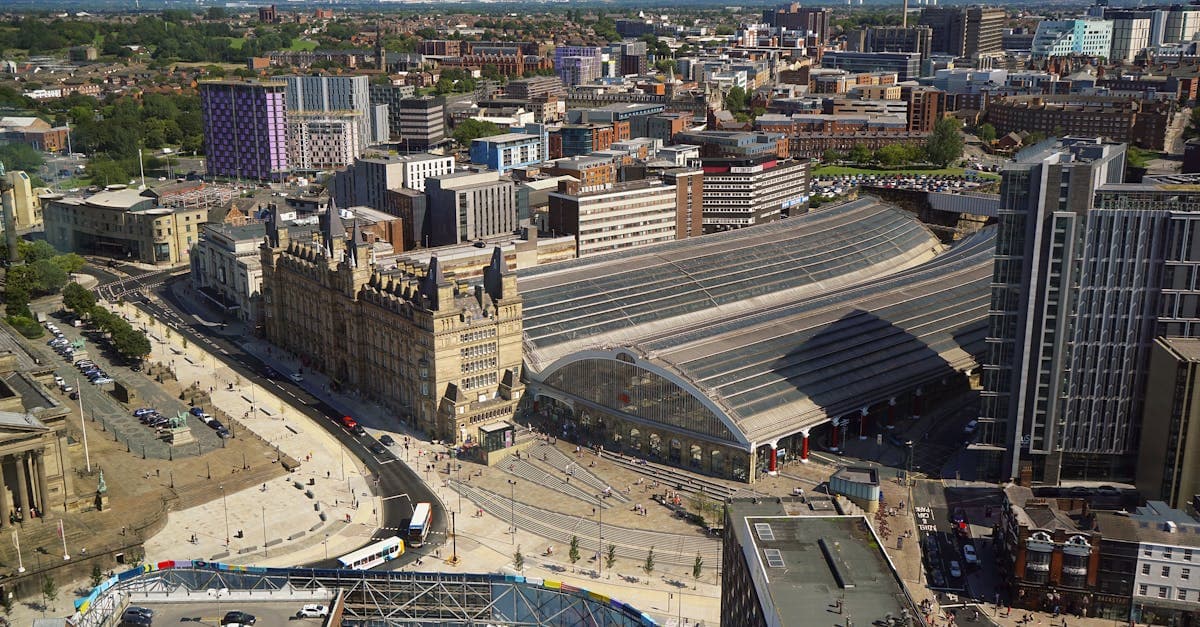 Explore the vibrant architecture of Liverpool with this stunning aerial shot showcasing Lime Street Station.