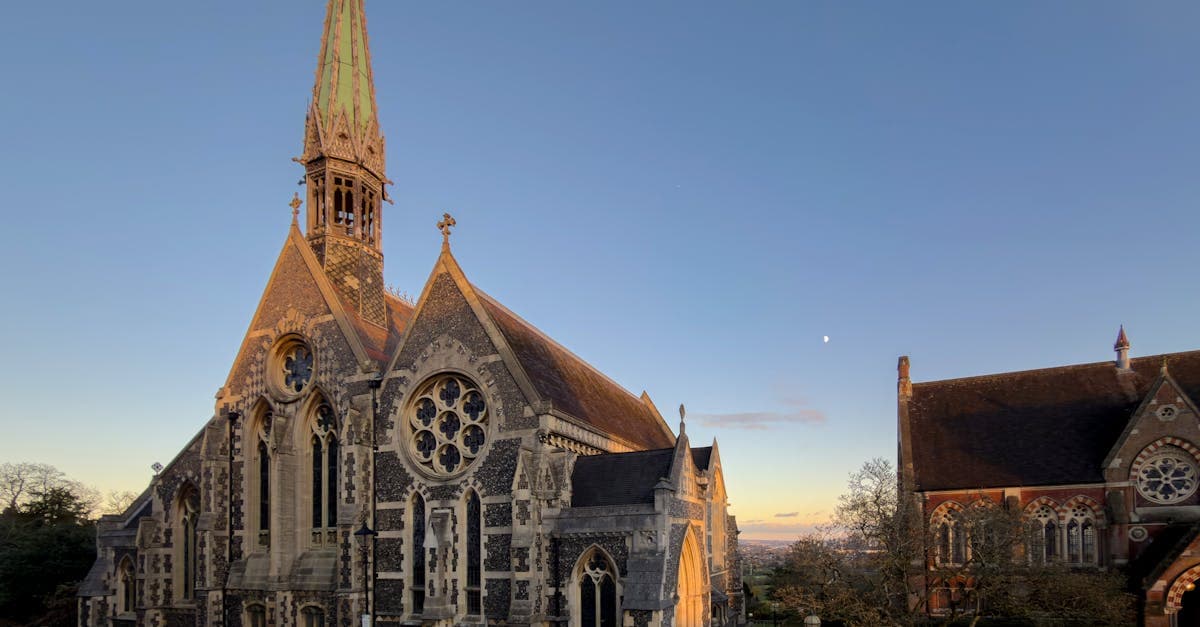 The iconic Harrow School Chapel at dusk with beautiful architectural details.