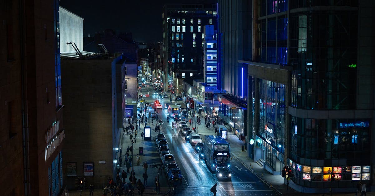 Explore the bustling nightlife and urban streets of Glasgow, Scotland under city lights.