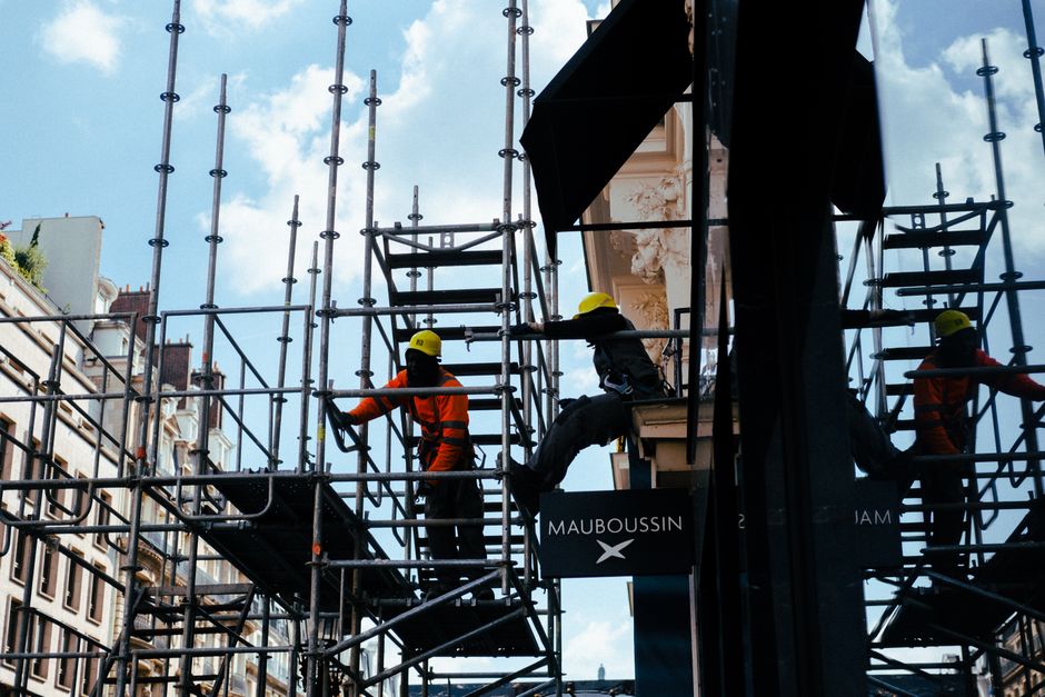 A UK construction subcontractor reviewing an application for payment on a commercial building site