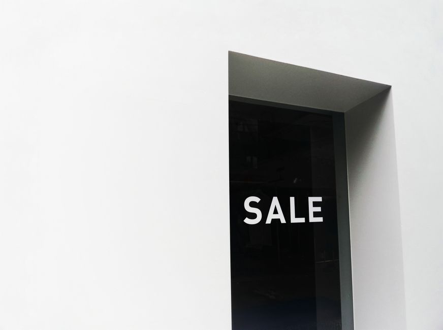 Business owner organising financial records and contracts ahead of a company sale